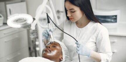 Dermatologist and patient in a skin treatment