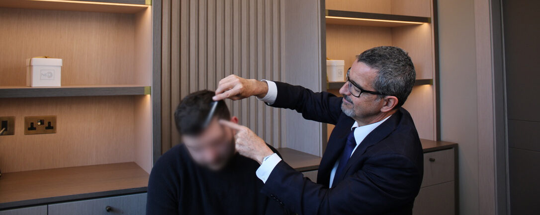 Dr checking patient's hair