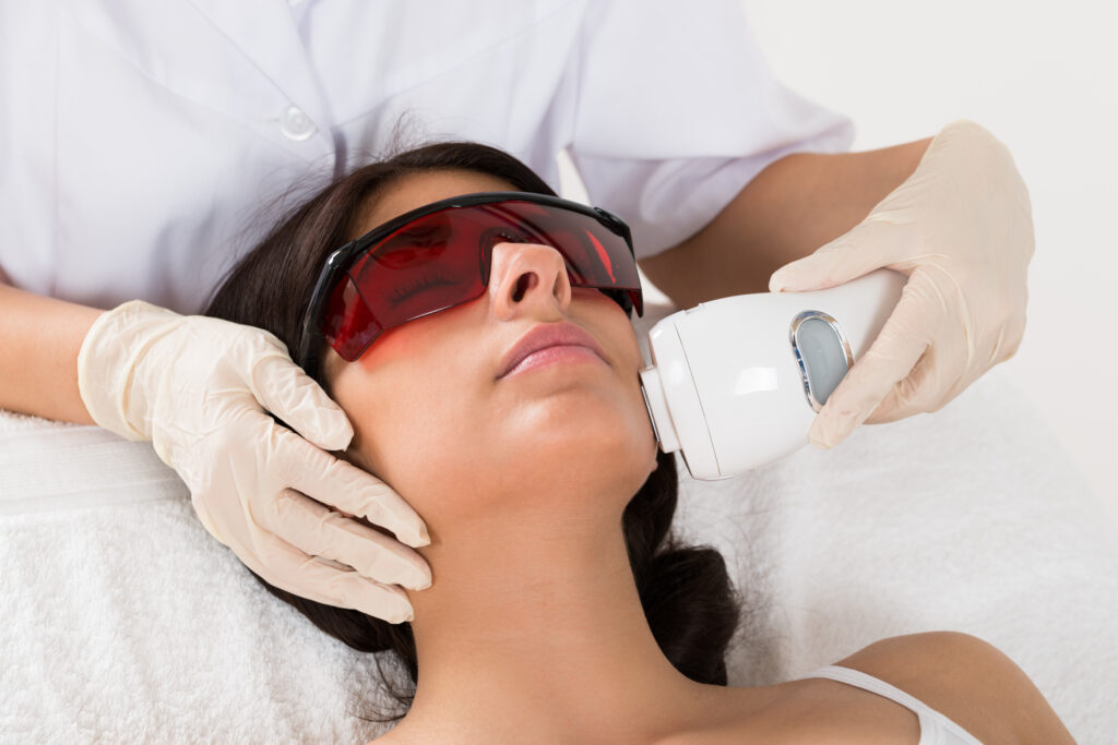 Woman in a laser treatment